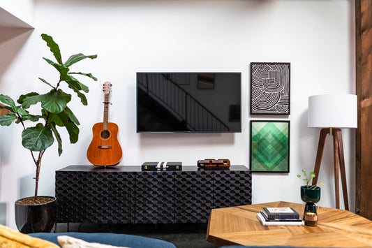 Eclectic family living room with solid walnut coffee table and  gallery wall — how long does a design last — A Design Lifestyle