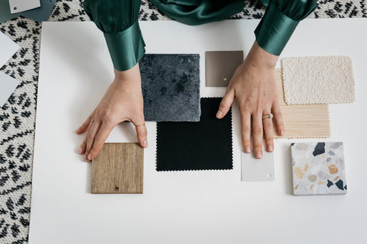 Interior design material samples flat lay with natural fabrics  and stone finishes — interior designer process — A Design Lifestyle